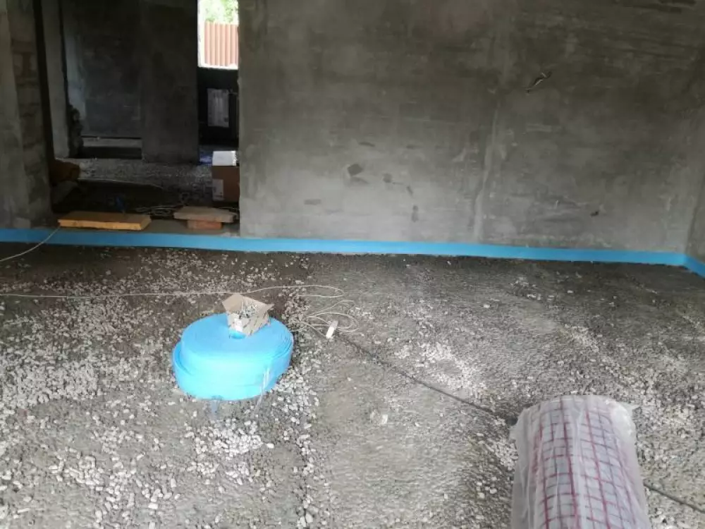 Монтаж водяного теплого пола в гостиной и в ванной