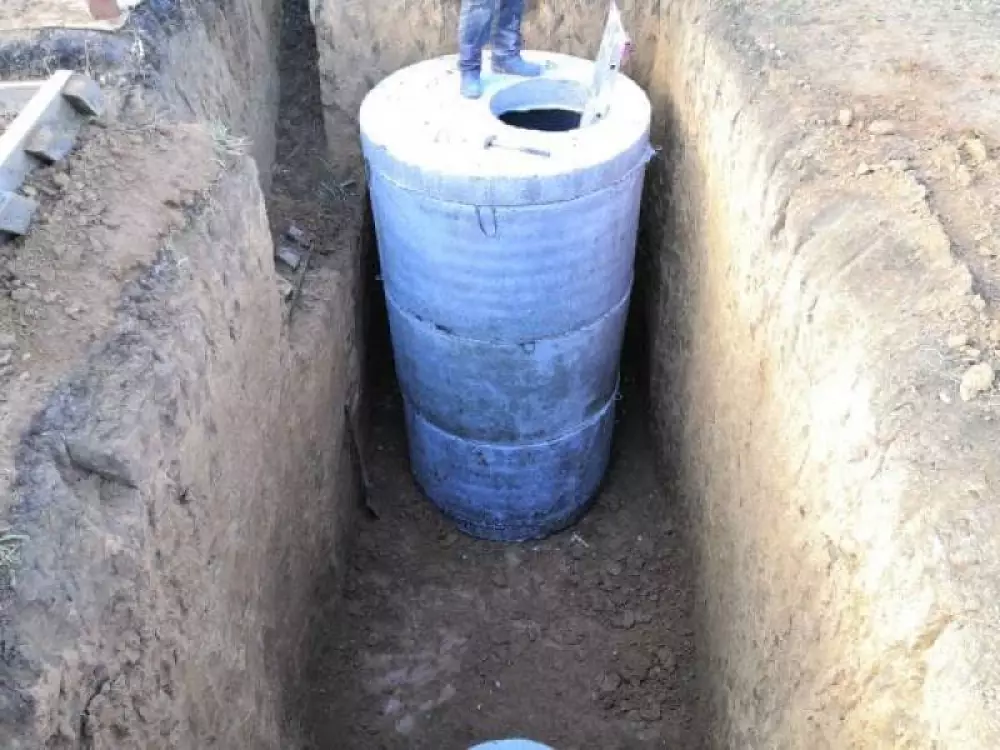 Монтаж септика из бетонных колец в частном доме