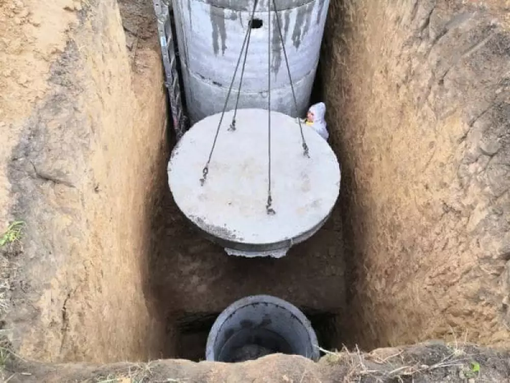 Монтаж септика из бетонных колец в частном доме