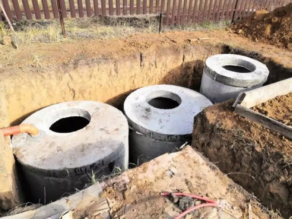Монтаж септика из бетонных колец в частном доме